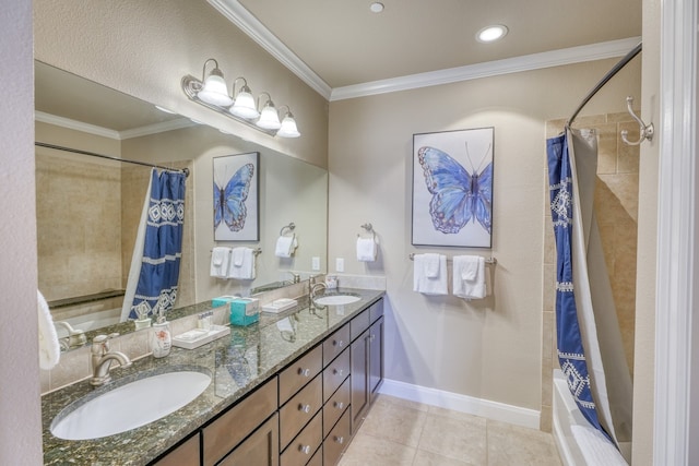 full bathroom featuring baseboards, tile patterned floors, a sink, and crown molding