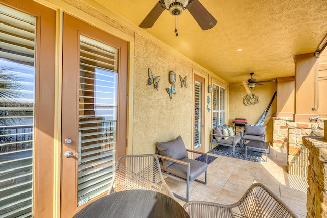 view of patio / terrace featuring a ceiling fan