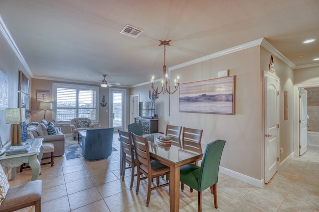 dining space with visible vents, crown molding, baseboards, and light tile patterned floors