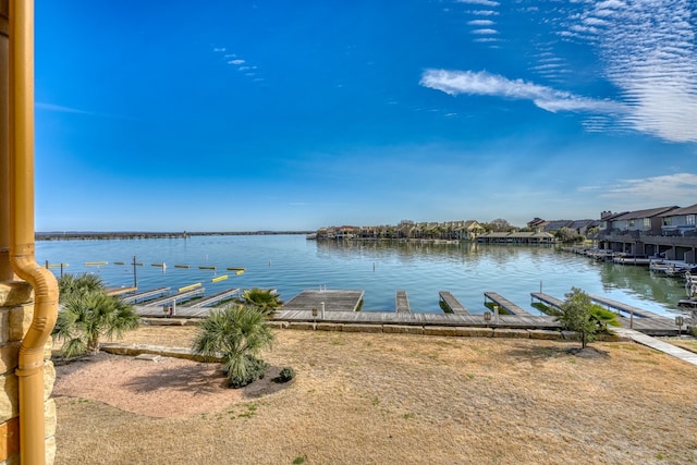 water view featuring a boat dock and boat lift