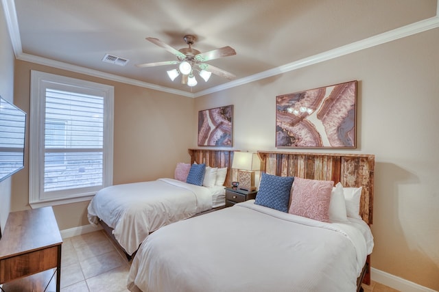 bedroom with light tile patterned floors, a ceiling fan, baseboards, visible vents, and crown molding