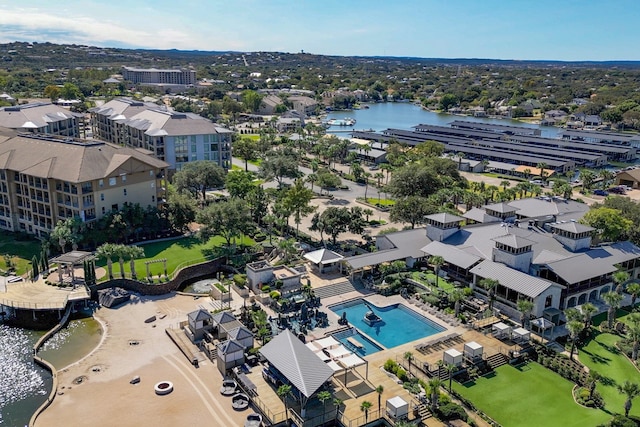 birds eye view of property with a water view