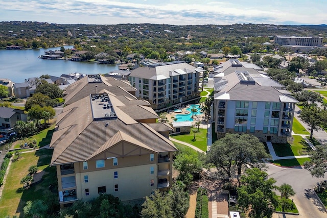 birds eye view of property featuring a water view