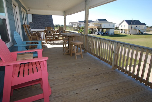 wooden deck with a residential view