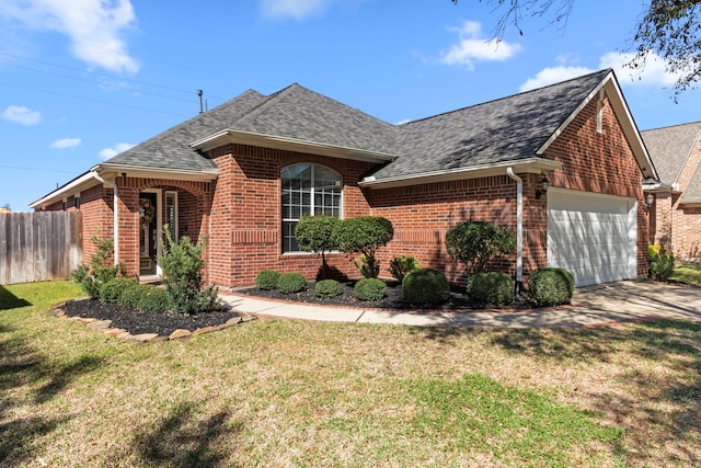 view of front of property with a front lawn, a garage, brick siding, and a shingled roof