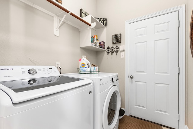 laundry area featuring laundry area and separate washer and dryer