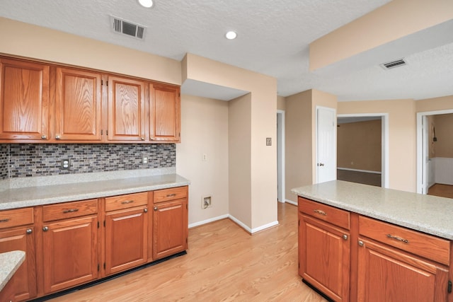 kitchen with light countertops and visible vents