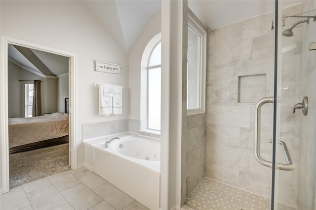 ensuite bathroom featuring ensuite bathroom, a stall shower, vaulted ceiling, and a jetted tub