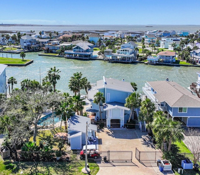 aerial view featuring a water view and a residential view