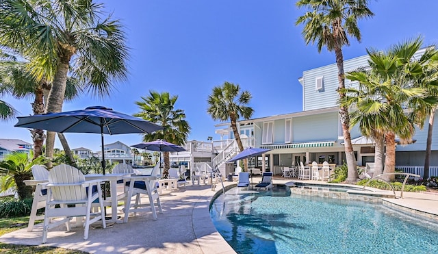 outdoor pool featuring a patio