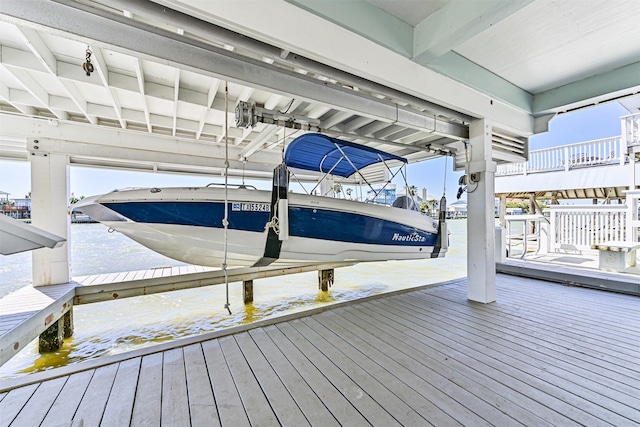 view of dock with boat lift