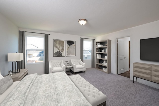 bedroom with carpet floors and multiple windows