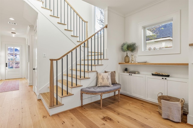 203 Munford St, Houston, TX 77008 - stairway featuring recessed lighting, visible vents, crown molding, and hardwood / wood-style flooring