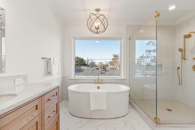 203 Munford St, Houston, TX 77008 - full bathroom with crown molding, a freestanding bath, a shower stall, marble finish floor, and vanity