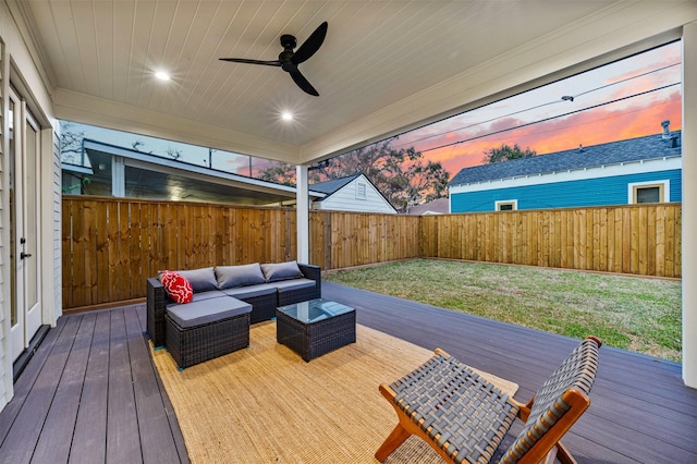 203 Munford St, Houston, TX 77008 - wooden terrace with a fenced backyard, ceiling fan, an outdoor living space, and a lawn