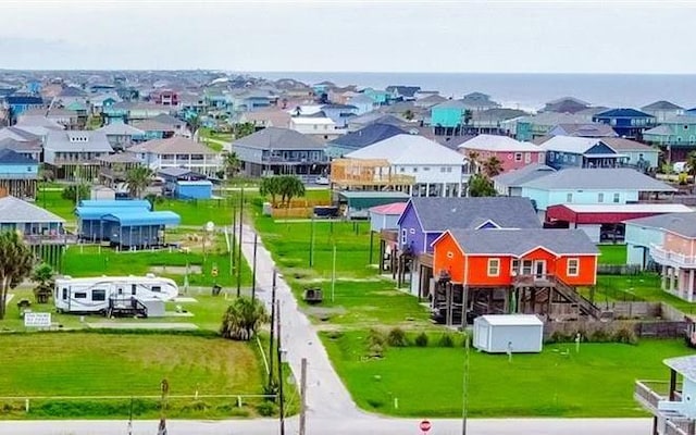 birds eye view of property with a residential view