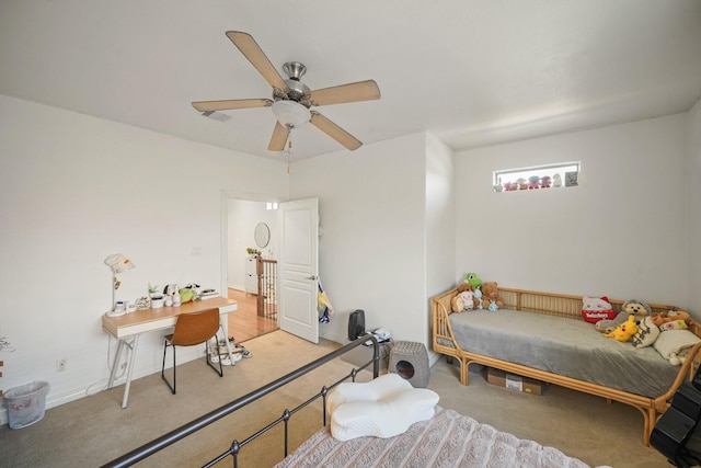 bedroom featuring light carpet and ceiling fan