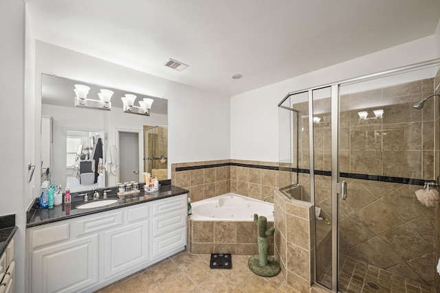 bathroom featuring a shower stall, visible vents, vanity, and a tub with jets