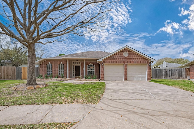 ranch-style home with driveway, brick siding, an attached garage, fence, and a front yard