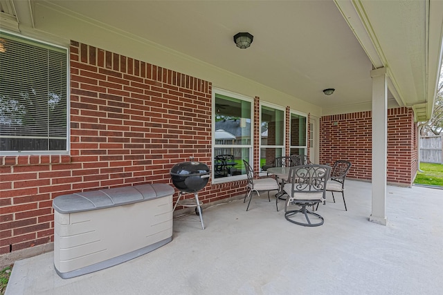 view of patio / terrace featuring outdoor dining space and grilling area