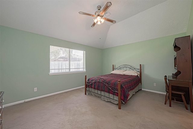 bedroom featuring lofted ceiling, carpet flooring, ceiling fan, and baseboards