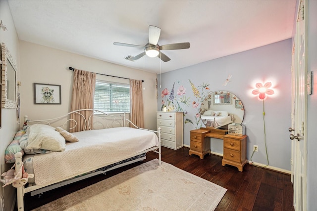 bedroom with visible vents, baseboards, dark wood-type flooring, and ceiling fan