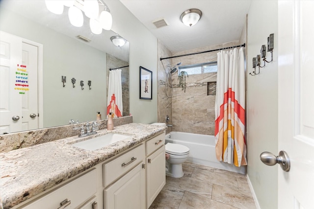 bathroom featuring vanity, shower / tub combo, toilet, and visible vents