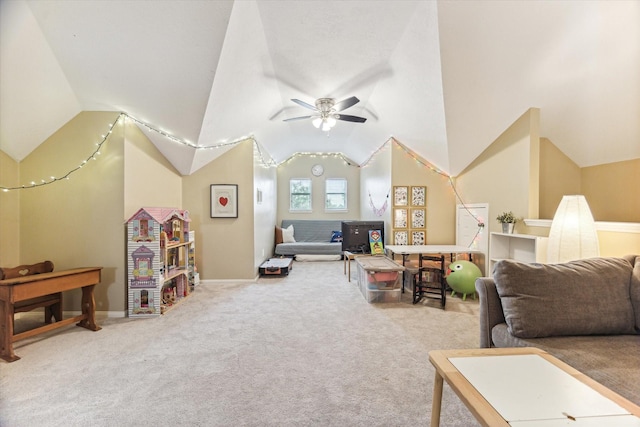 carpeted living area with lofted ceiling and ceiling fan