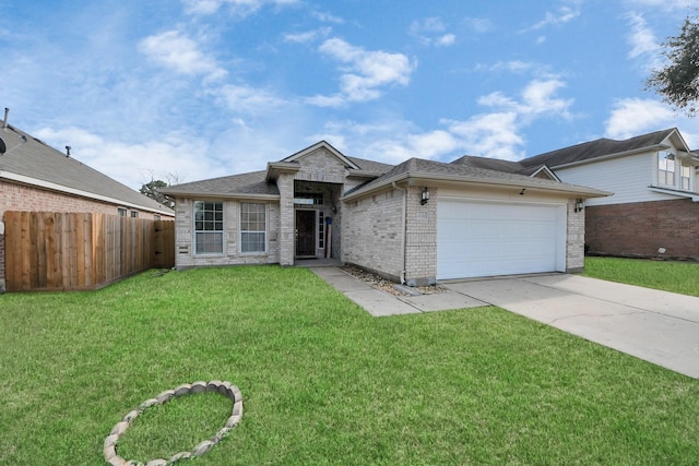 view of front facade featuring brick siding, fence, a garage, driveway, and a front lawn