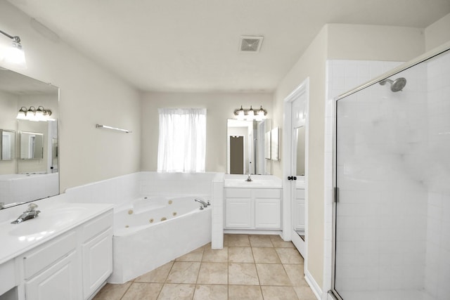 full bathroom with visible vents, a stall shower, a sink, tile patterned flooring, and a whirlpool tub