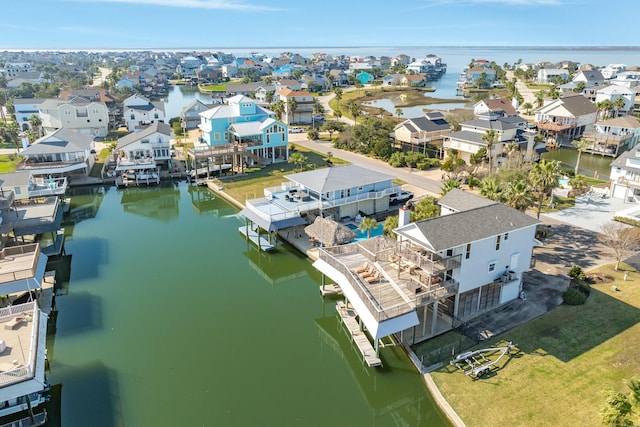 aerial view with a water view and a residential view