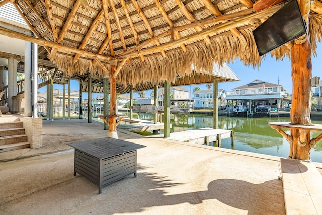 view of dock with a water view