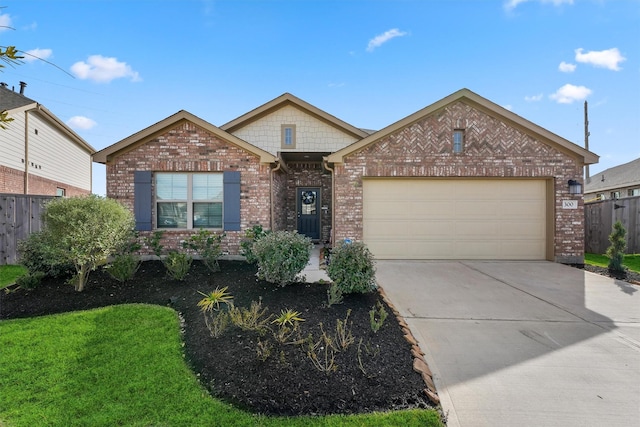 view of front facade with an attached garage, fence, concrete driveway, and brick siding