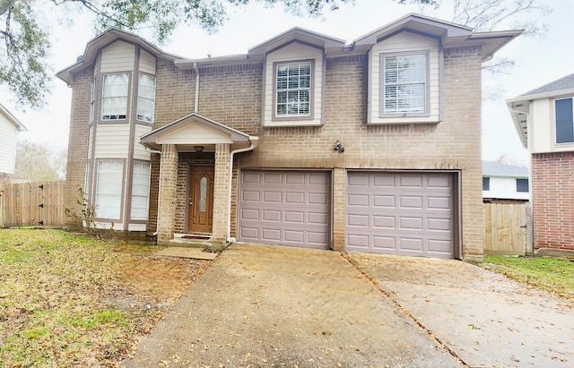 view of front of house featuring a garage, brick siding, driveway, and fence