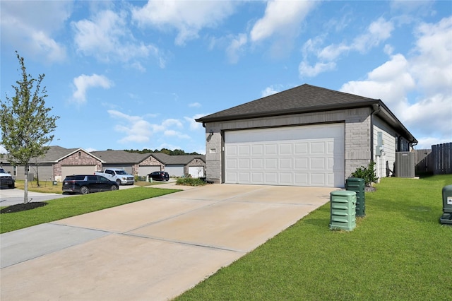 view of side of property with roof with shingles, a yard, concrete driveway, fence, and cooling unit