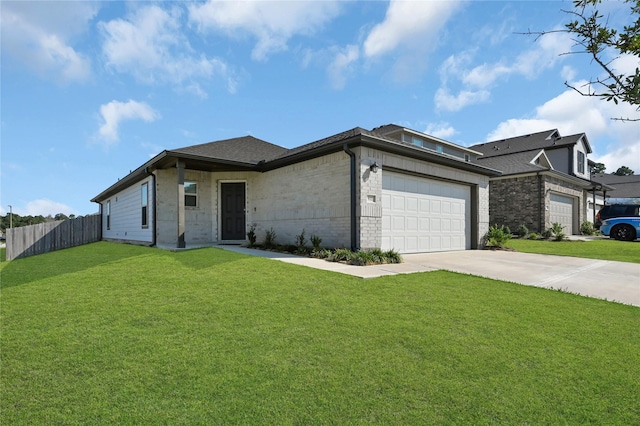 view of front of house featuring concrete driveway, an attached garage, fence, a front yard, and brick siding