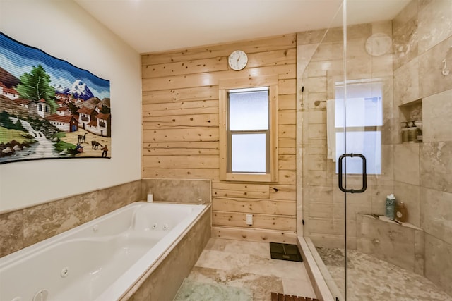 full bathroom with a jetted tub, a shower stall, and wooden walls