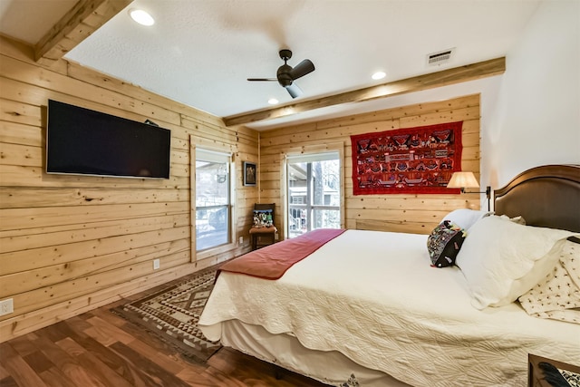 bedroom featuring recessed lighting, visible vents, wood walls, wood finished floors, and beamed ceiling