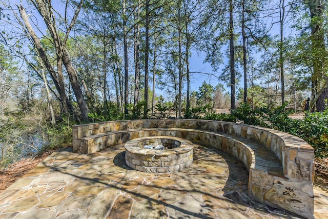 view of patio featuring a fire pit