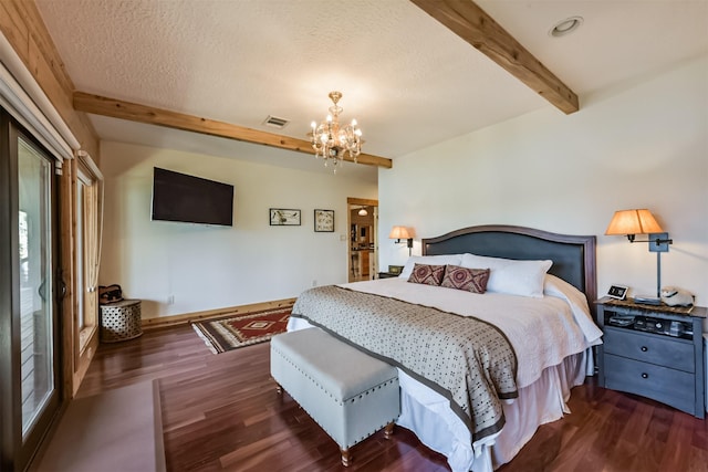 bedroom with dark wood-style floors, a chandelier, visible vents, and beamed ceiling