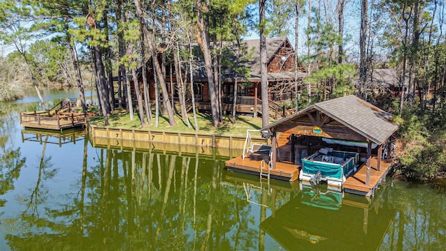 dock area featuring a water view and boat lift