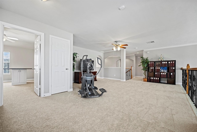 workout area with carpet flooring and baseboards