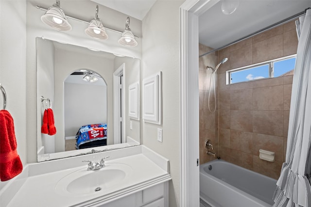 full bath featuring vanity and shower / bathtub combination with curtain