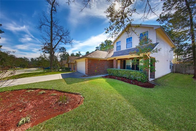 traditional-style home featuring a garage, brick siding, concrete driveway, fence, and a front yard