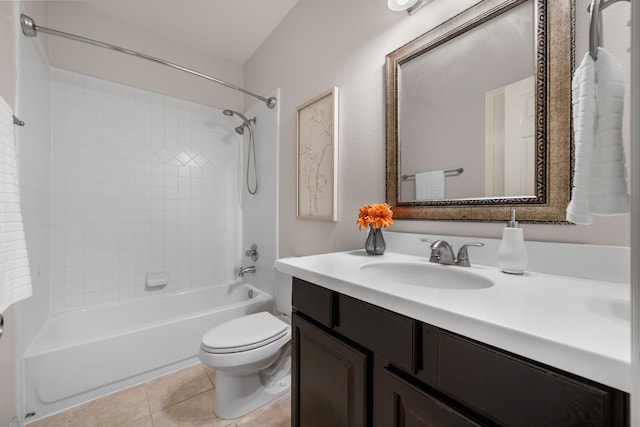 full bath with vanity, tile patterned floors, toilet, and  shower combination