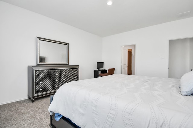 bedroom featuring carpet floors and baseboards