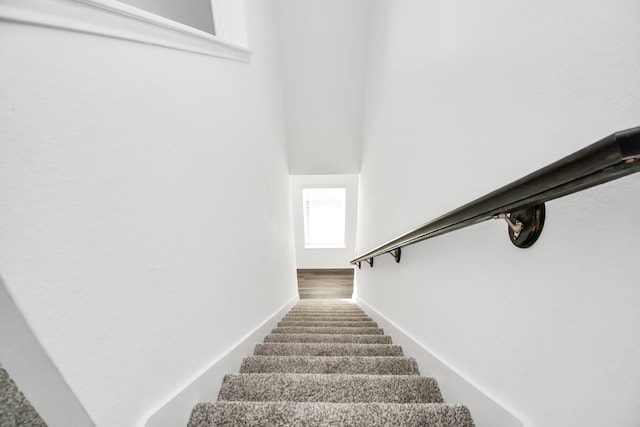 staircase with baseboards