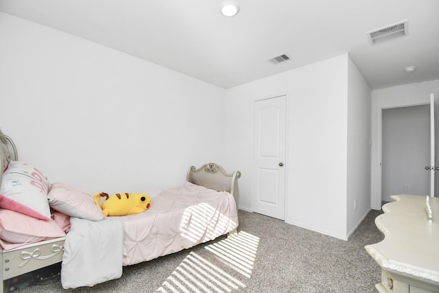 bedroom featuring carpet flooring, visible vents, and baseboards