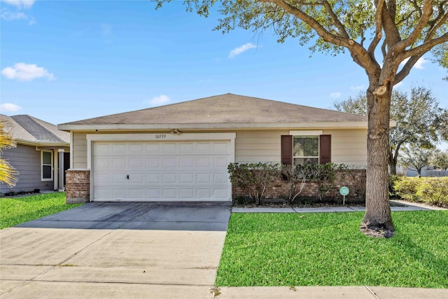 single story home with a garage, a front yard, concrete driveway, and brick siding