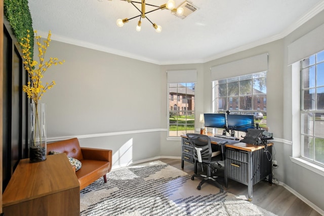 office featuring baseboards, wood finished floors, and crown molding